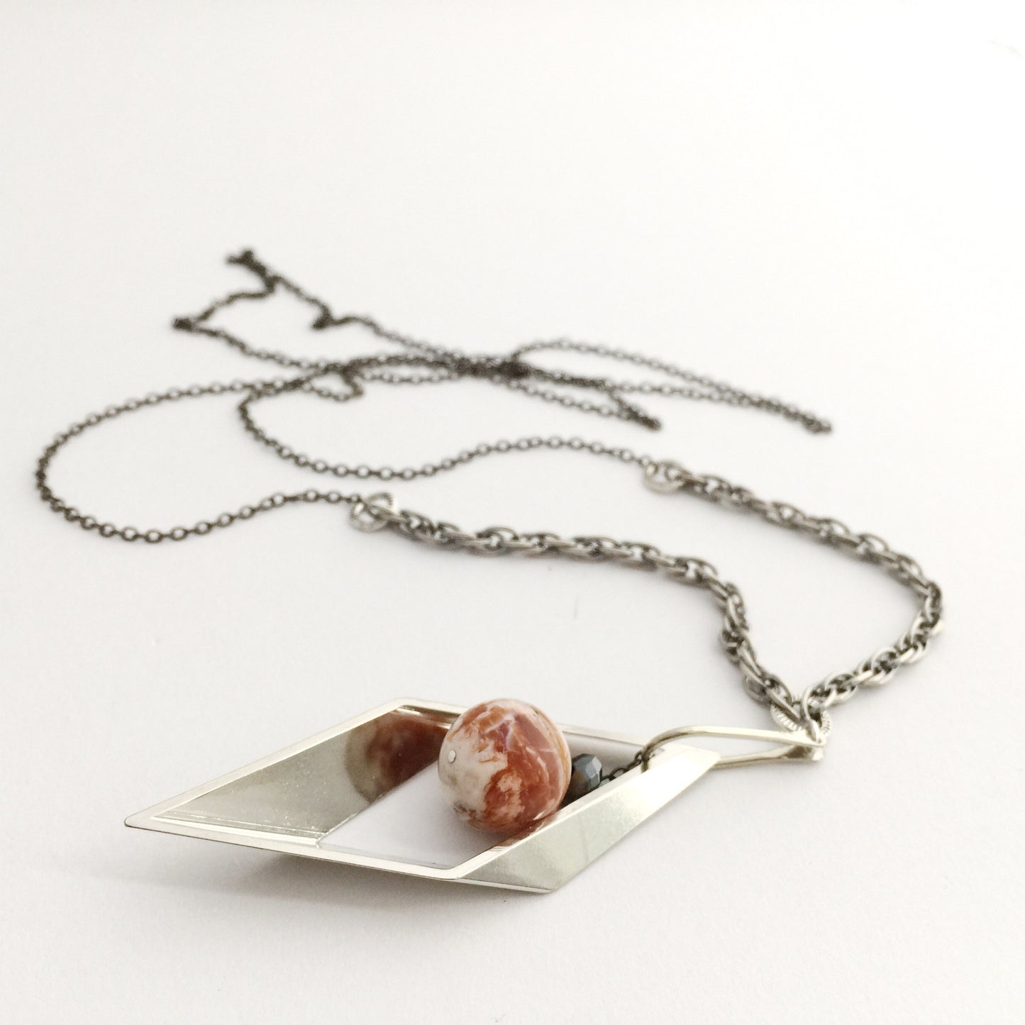 Kinetic Necklaces in Gold and Silver