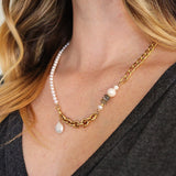 The Aletta Necklace by Third & Co. Studio: fresh water pearl, vintage gold-toned chain, mother of pearl and labradorite, create this adjustable length, wear-two-ways necklace. Can also be worn as a bracelet by wrapping around the wrist. Necklace shown on a model at the longest adjustable length