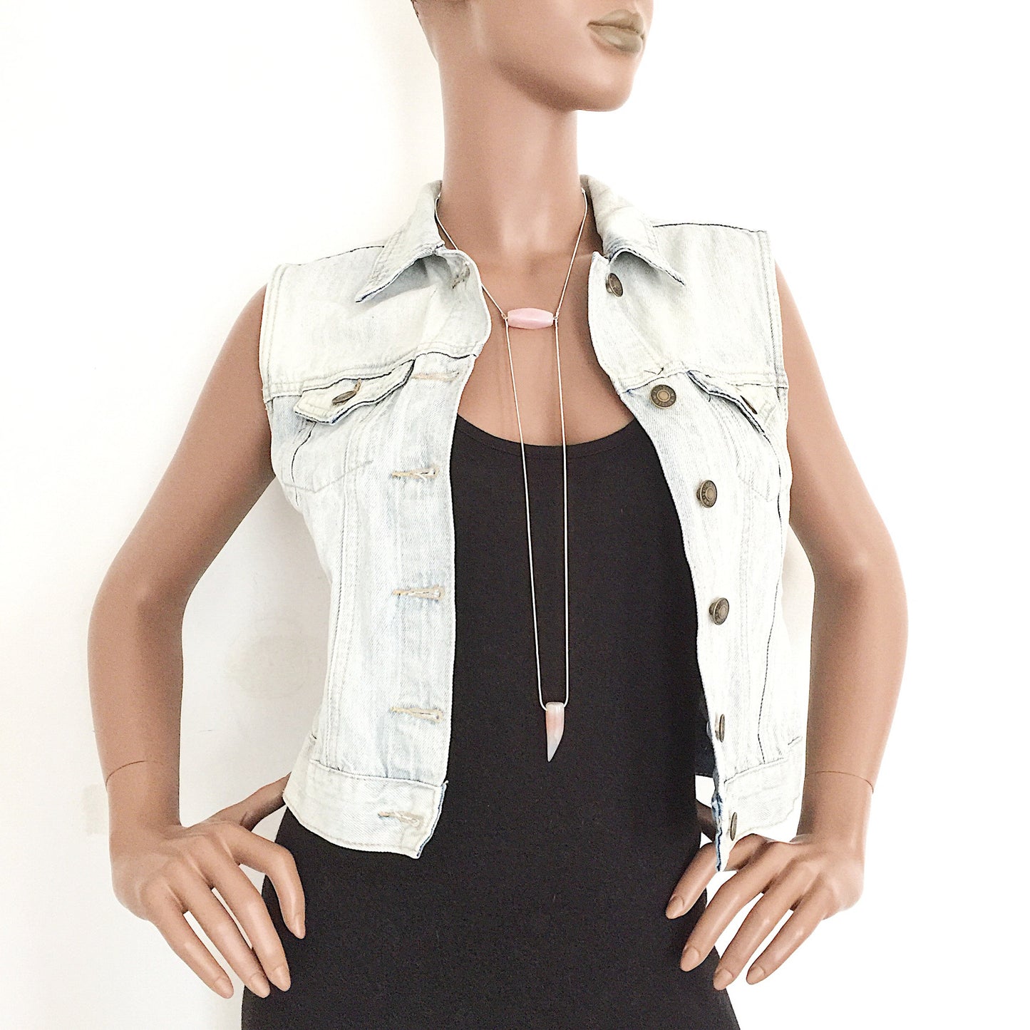 mannequin wearing the Binary Necklace by Third & Co. Studio: Agate "tooth" and tube shape in cream peach mauve orange, minimalist design with Sterling Silver snake chain lariat style long length, shown against a white background