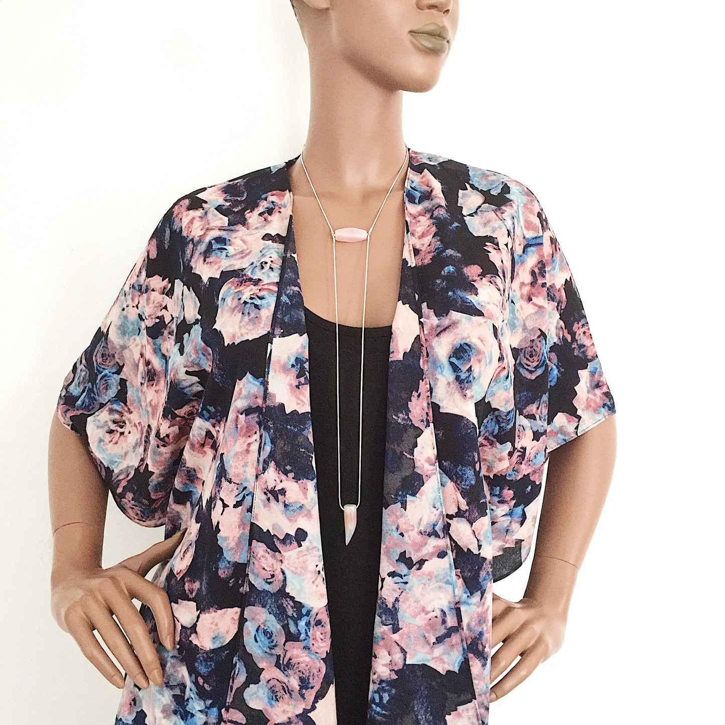 mannequin wearing the Binary Necklace by Third & Co. Studio: Agate "tooth" and tube shape in cream peach mauve orange, minimalist design with Sterling Silver snake chain lariat style long length, shown against a white background
