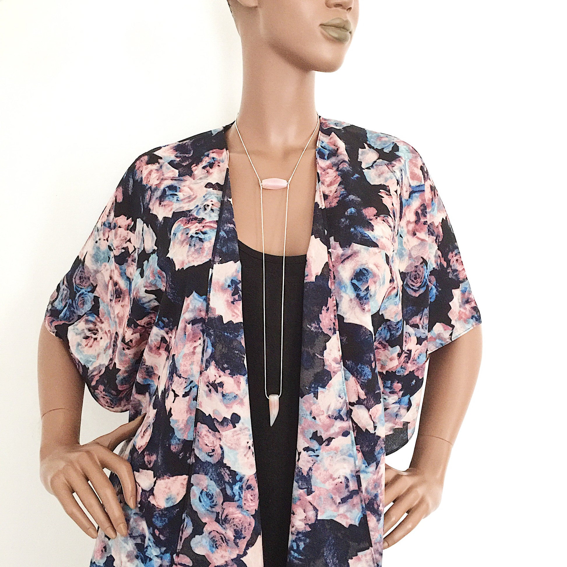 mannequin wearing the Binary Necklace by Third & Co. Studio: Agate "tooth" and tube shape in cream peach mauve orange, minimalist design with Sterling Silver snake chain lariat style long length, shown against a white background