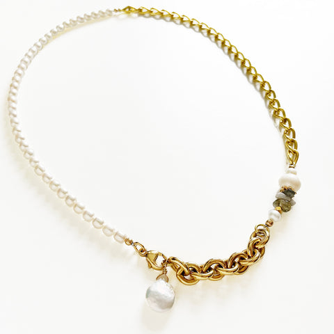 The Aletta Necklace by Third & Co. Studio: fresh water pearl, vintage gold-toned chain, mother of pearl and labradorite, create this adjustable length, wear-two-ways necklace. Can also be worn as a bracelet by wrapping around the wrist. Necklace shown against a white background